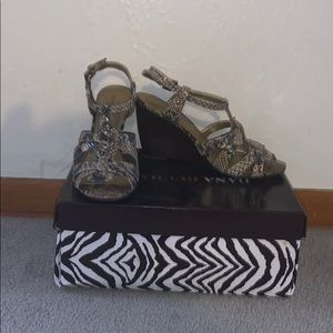 - Snake skin heels by DANA BUCHMAN